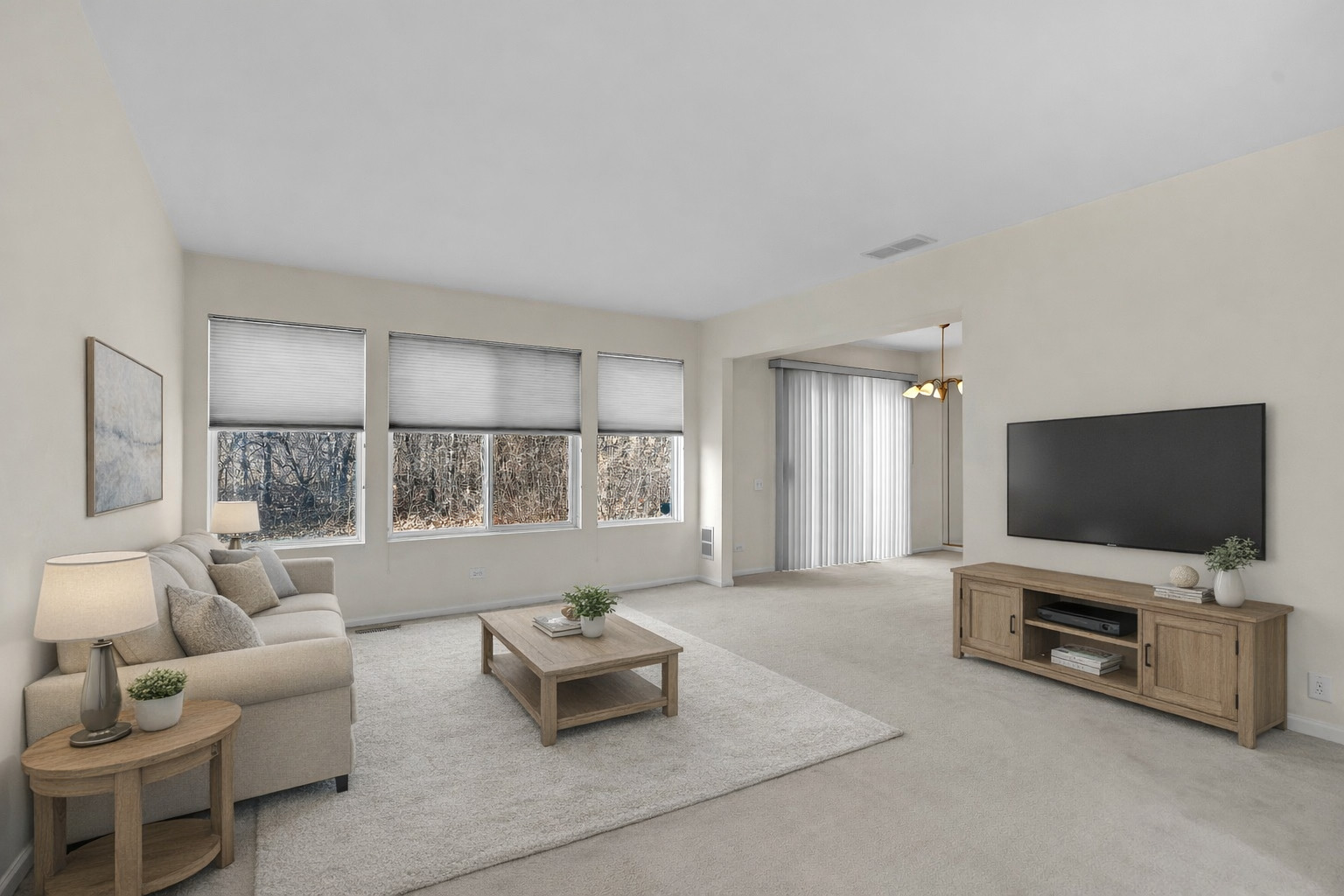 148 Locksley Drive Streamwood, IL 60107 - Photo 2 of 20 a living room with furniture and a flat screen tv