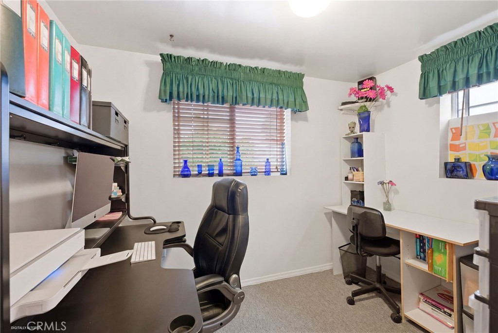 4456 12th Street Riverside, CA 92501 - Photo 20 of 70 a view of a workspace with furniture and a window