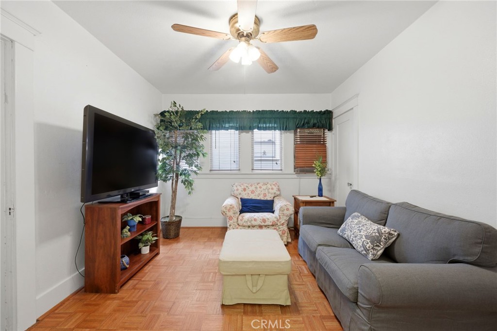 4456 12th Street Riverside, CA 92501 - Photo 23 of 70 a living room with furniture and a flat screen tv