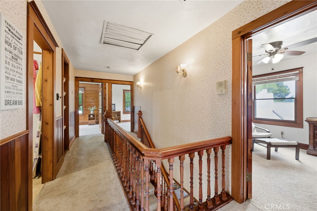 4456 12th Street Riverside, CA 92501 - Photo 29 of 70 a view of a hallway with wooden floor and windows