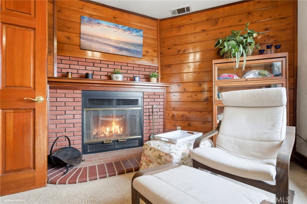 4456 12th Street Riverside, CA 92501 - Photo 33 of 70 a living room with furniture and a fireplace