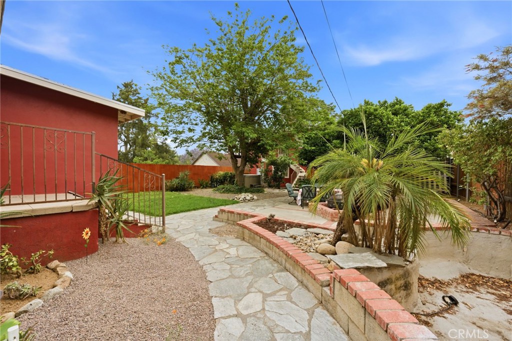 4456 12th Street Riverside, CA 92501 - Photo 51 of 70 a view of a backyard with potted plants