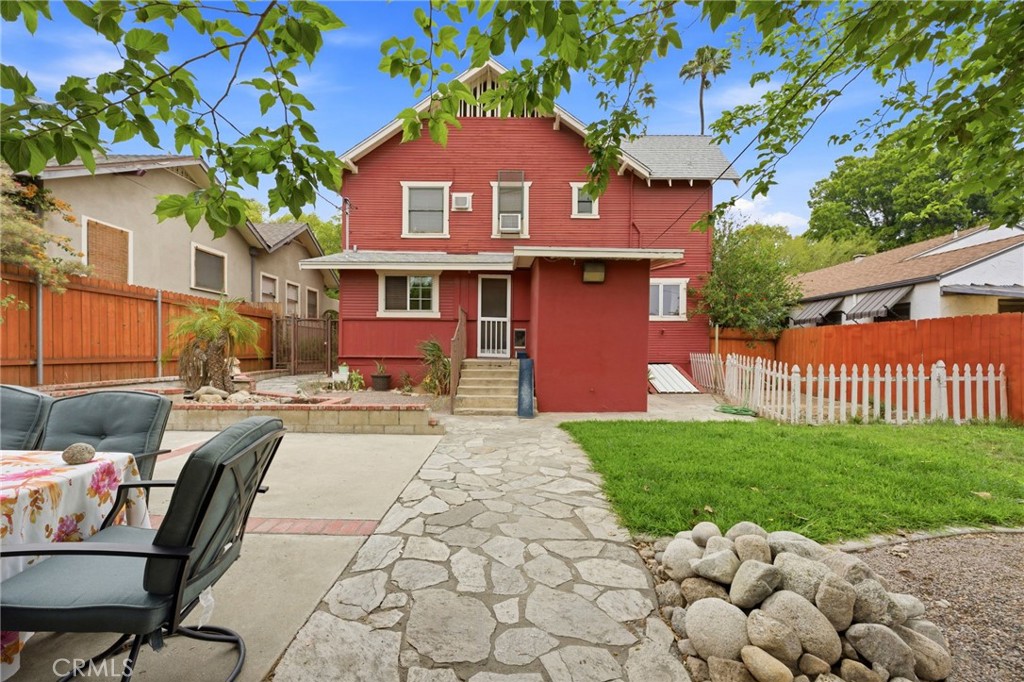 4456 12th Street Riverside, CA 92501 - Photo 52 of 70 a front view of a house with a yard