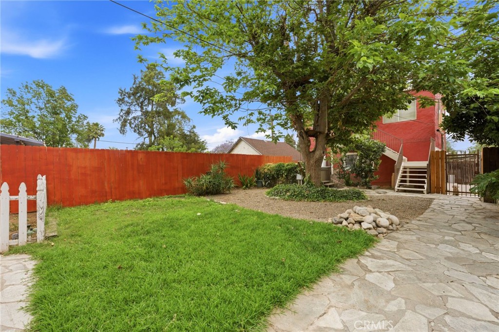 4456 12th Street Riverside, CA 92501 - Photo 56 of 70 a backyard of a house with lots of green space