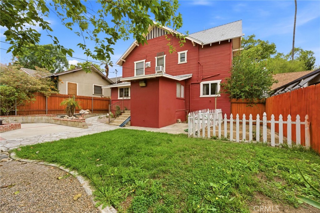 4456 12th Street Riverside, CA 92501 - Photo 57 of 70 a front view of a house with a garden and plants