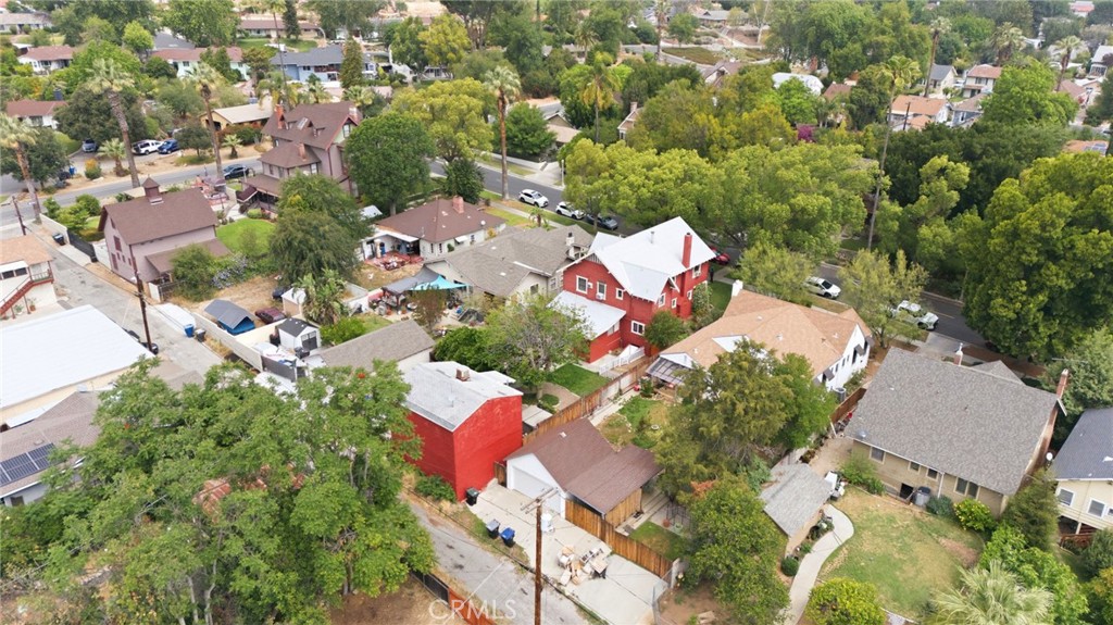 4456 12th Street Riverside, CA 92501 - Photo 62 of 70 an aerial view of residential house with outdoor space and trees all around