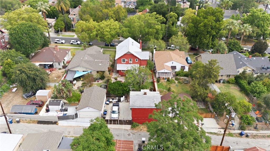 4456 12th Street Riverside, CA 92501 - Photo 63 of 70 an aerial view of residential house with outdoor space and parking
