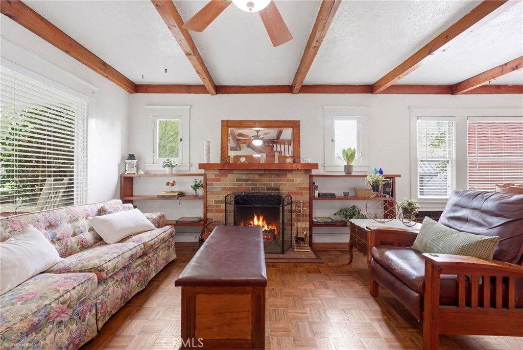4456 12th Street Riverside, CA 92501 - Photo 7 of 70 a living room with furniture and a fireplace