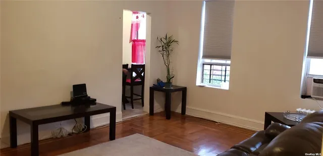 a room with furniture and a window