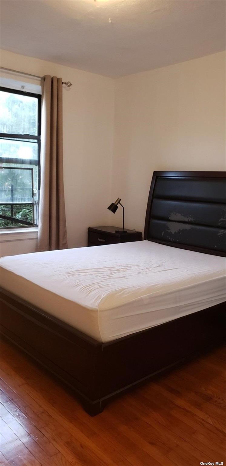 44-15 43rd Avenue, Unit 5N Queens, NY 11104 - Photo 8 of 11 a close up of a bed