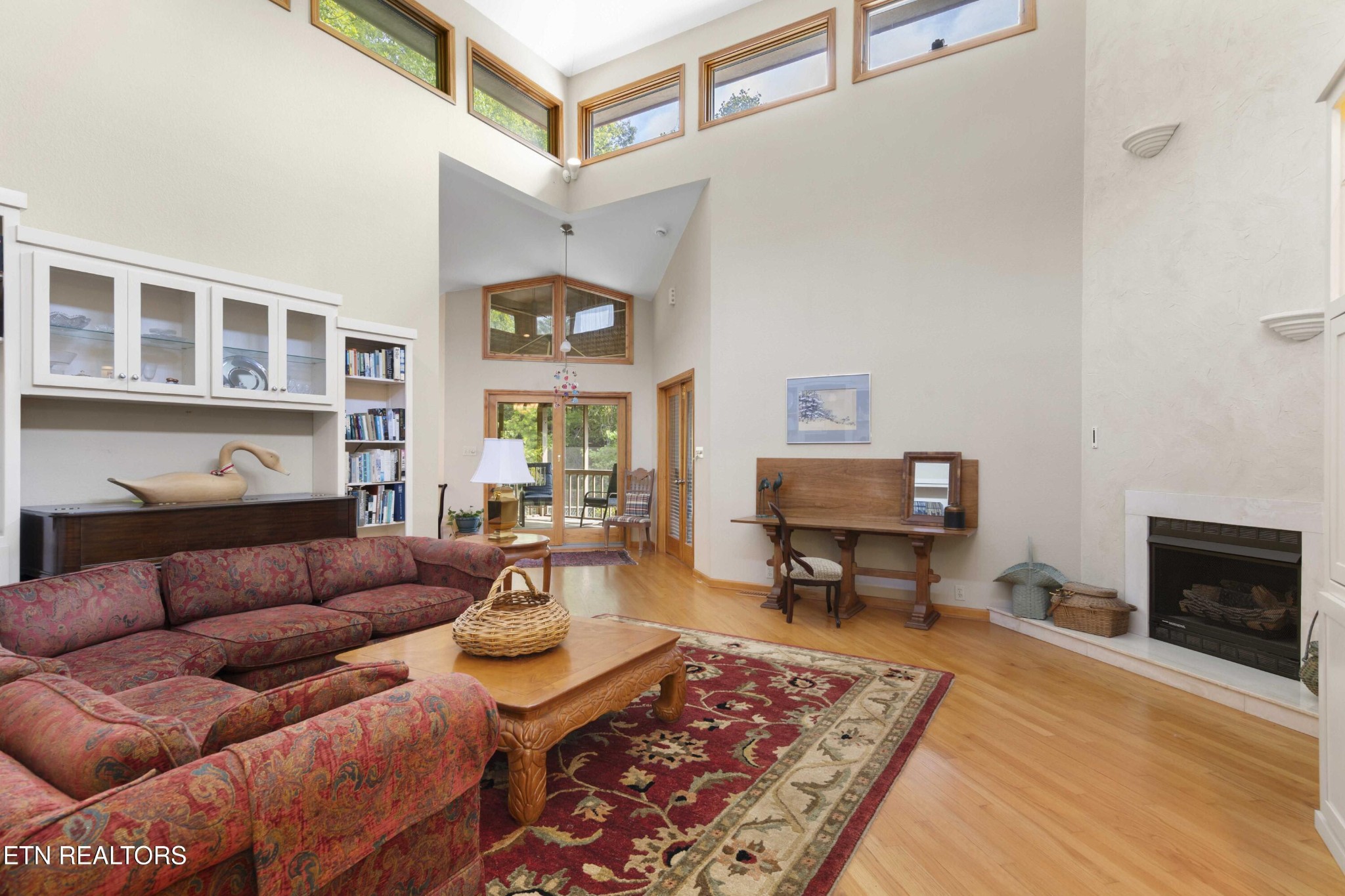 780 Old Emory Road Clinton, TN 37716 - Photo 21 of 33 a living room with furniture and a fireplace