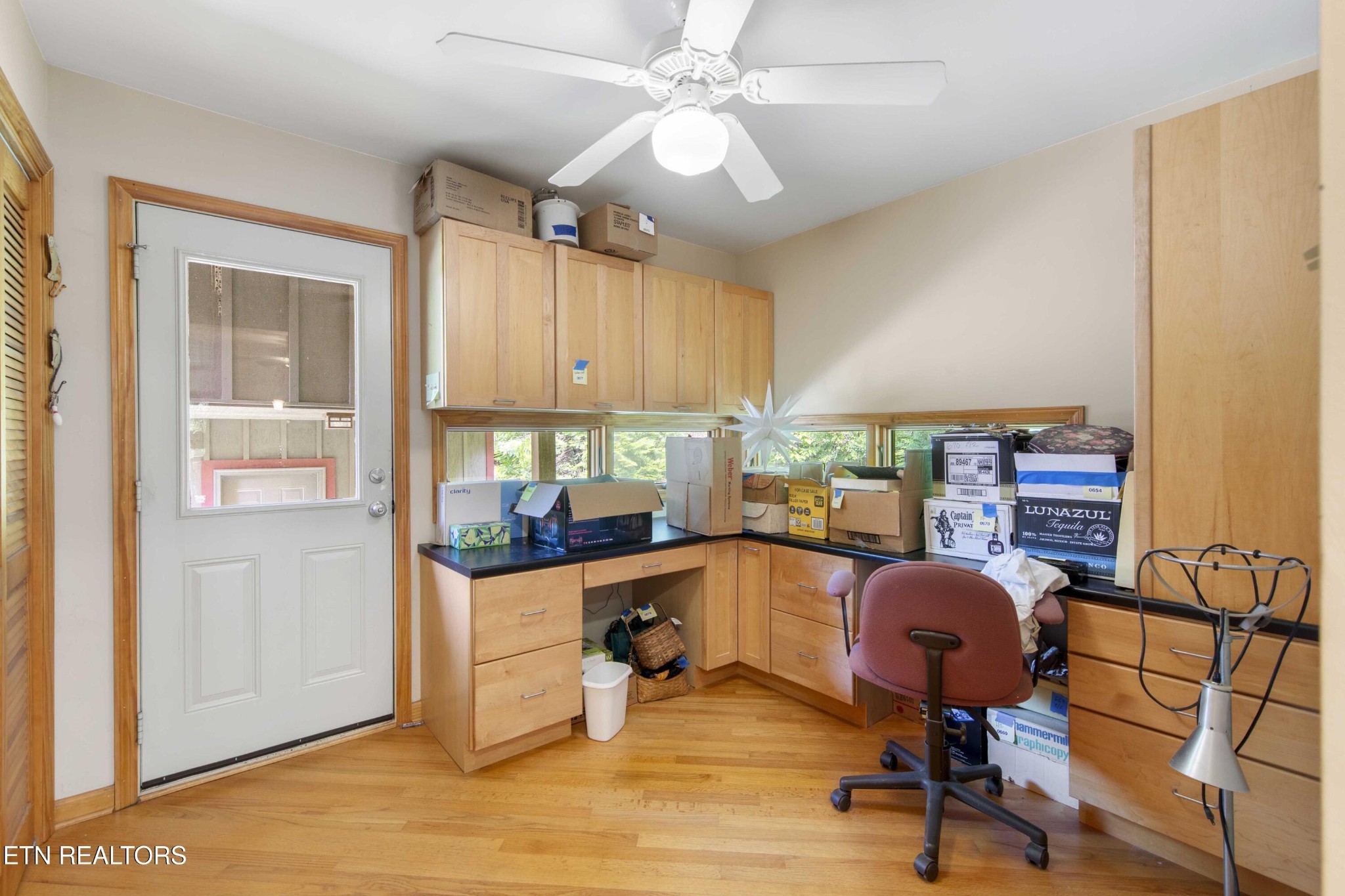 780 Old Emory Road Clinton, TN 37716 - Photo 23 of 33 a view of a workspace with furniture and a window