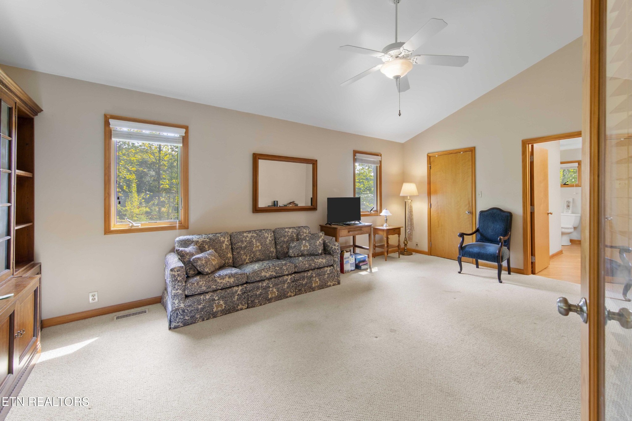 780 Old Emory Road Clinton, TN 37716 - Photo 31 of 33 a living room with furniture and a chandelier