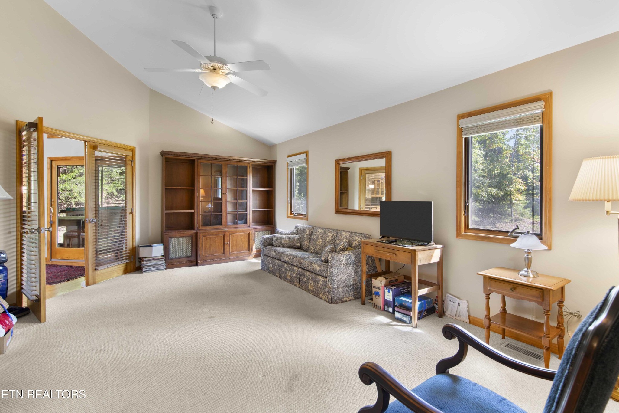 780 Old Emory Road Clinton, TN 37716 - Photo 32 of 33 a living room with furniture and a fireplace
