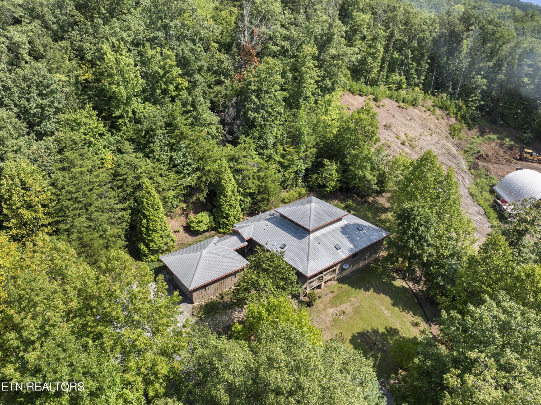 780 Old Emory Road Clinton, TN 37716 - Photo 5 of 33 an aerial view of a house with a yard