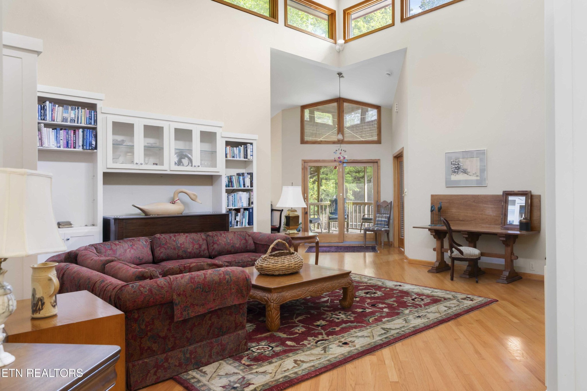 780 Old Emory Road Clinton, TN 37716 - Photo 7 of 33 a living room with furniture a rug and a window