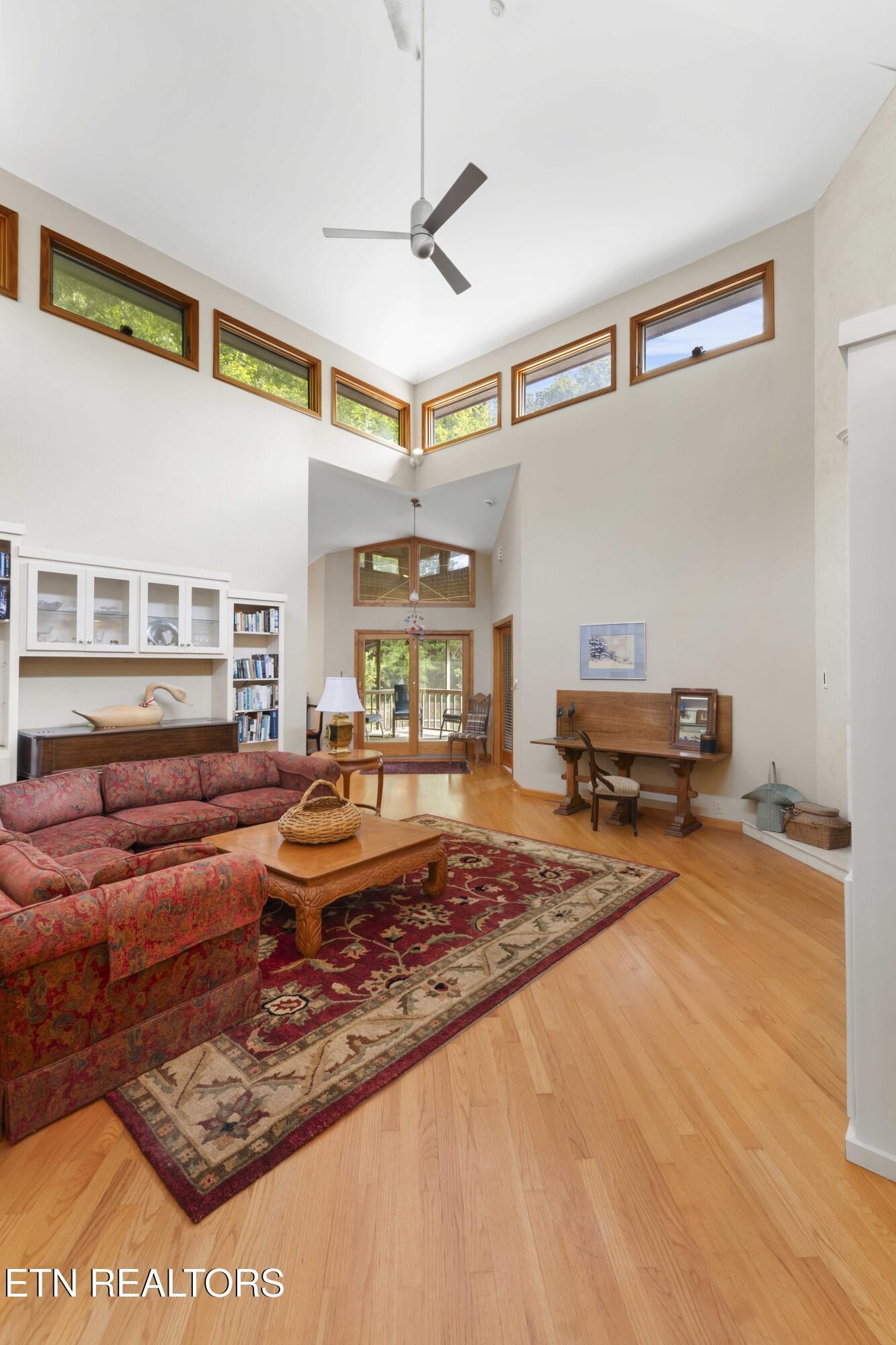 780 Old Emory Road Clinton, TN 37716 - Photo 10 of 33 a living room with furniture and a rug