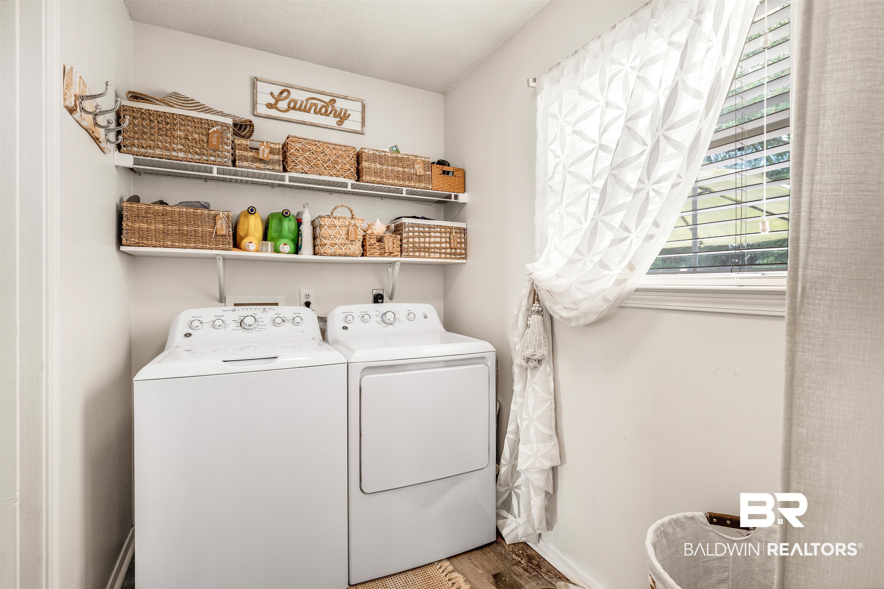 518 Ariel Avenue Foley, AL 36535 - Photo 16 of 47 Clothes washing area featuring independent washer and dryer and hardwood / wood-style floors
