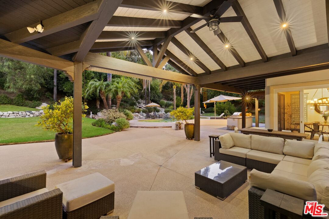 25217 Eldorado Meadow Road Hidden Hills, CA 91302 - Photo 26 of 28 a outdoor living space with furniture and garden view
