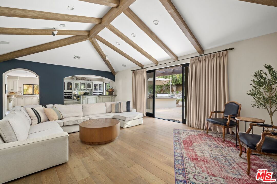 25217 Eldorado Meadow Road Hidden Hills, CA 91302 - Photo 6 of 28 a living room with furniture and a table