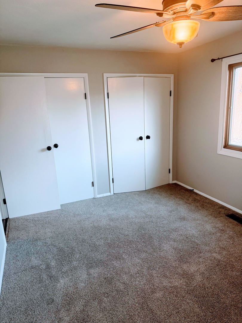 2511 Trafalgar Square Champaign, IL 61821 - Photo 20 of 26 a view of an empty room with a window