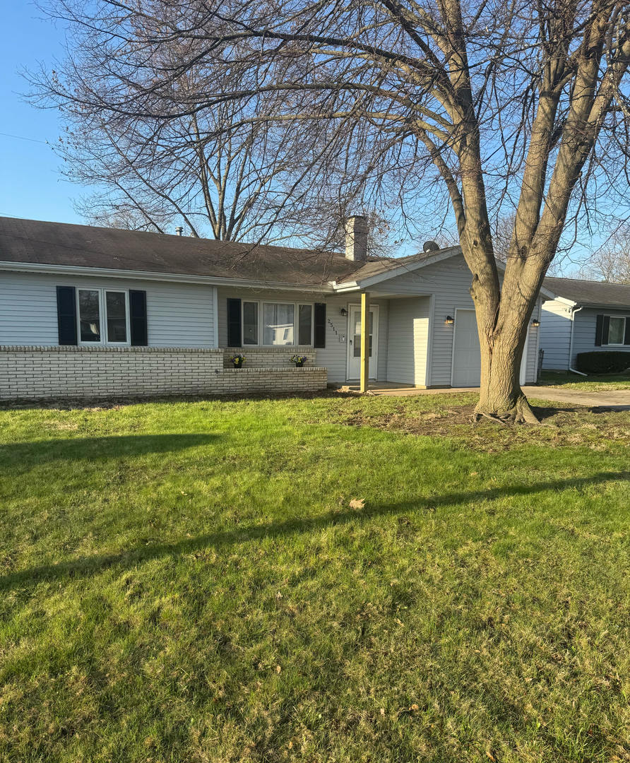 2511 Trafalgar Square Champaign, IL 61821 - Photo 2 of 26 a house view with a outdoor space