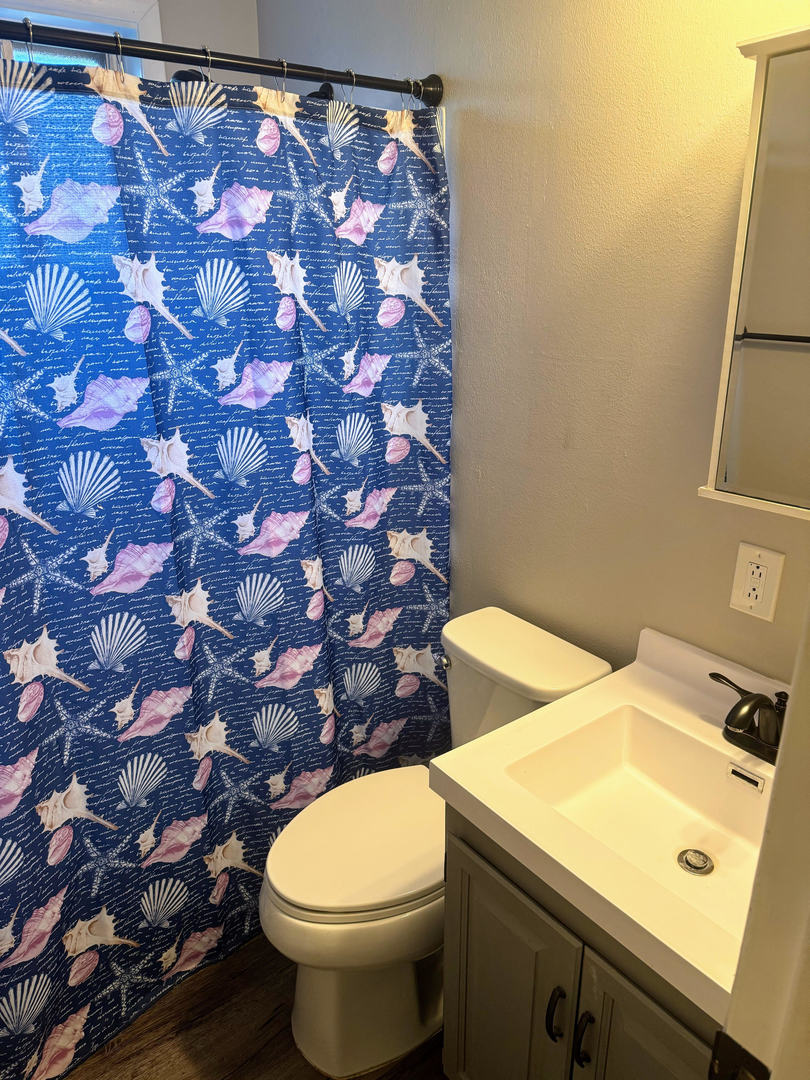 2511 Trafalgar Square Champaign, IL 61821 - Photo 23 of 26 a bathroom with a sink and a toilet