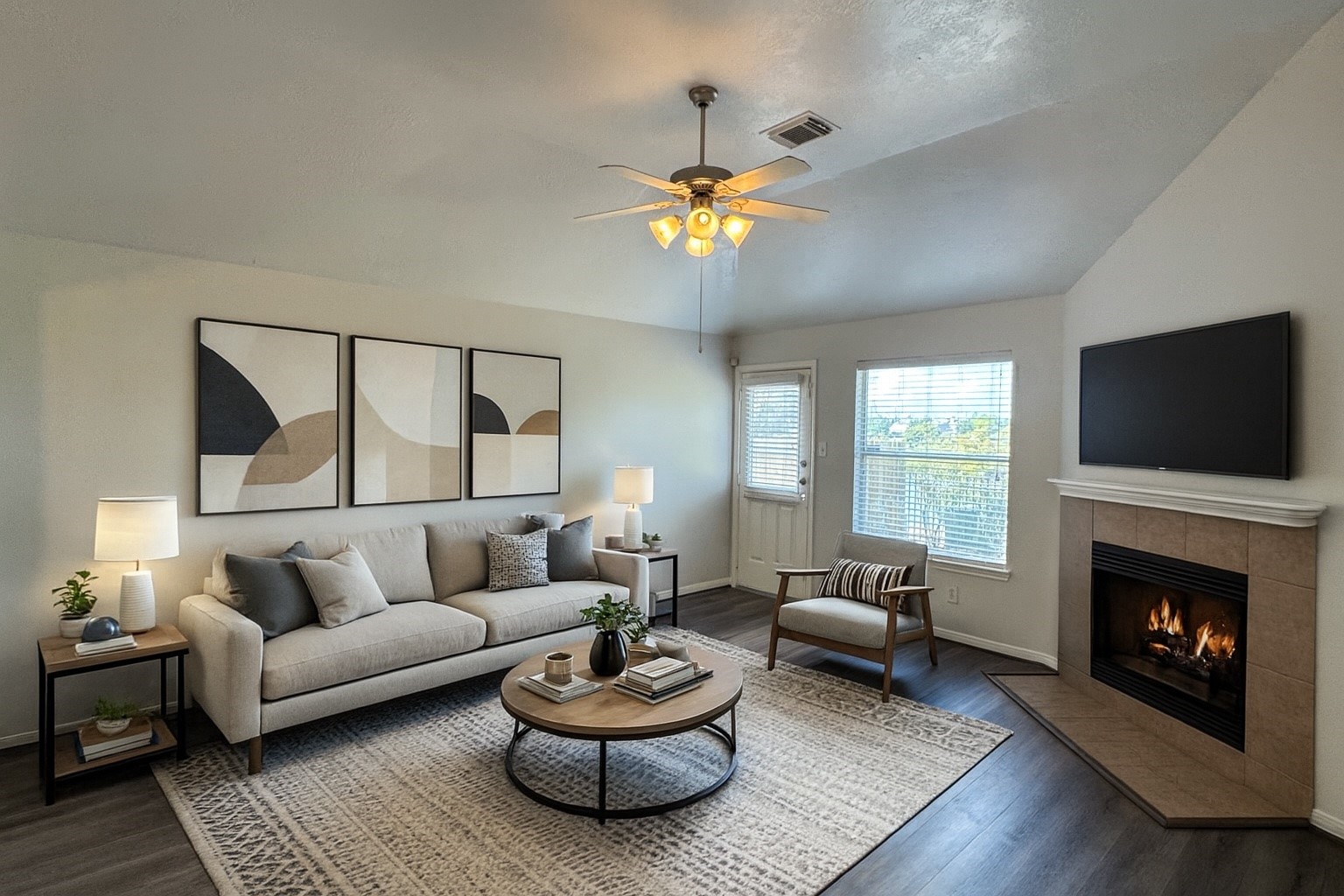 21543 Falvel Misty Drive Spring, TX 77388 - Photo 1 of 40 a living room with furniture a fireplace and a flat screen tv