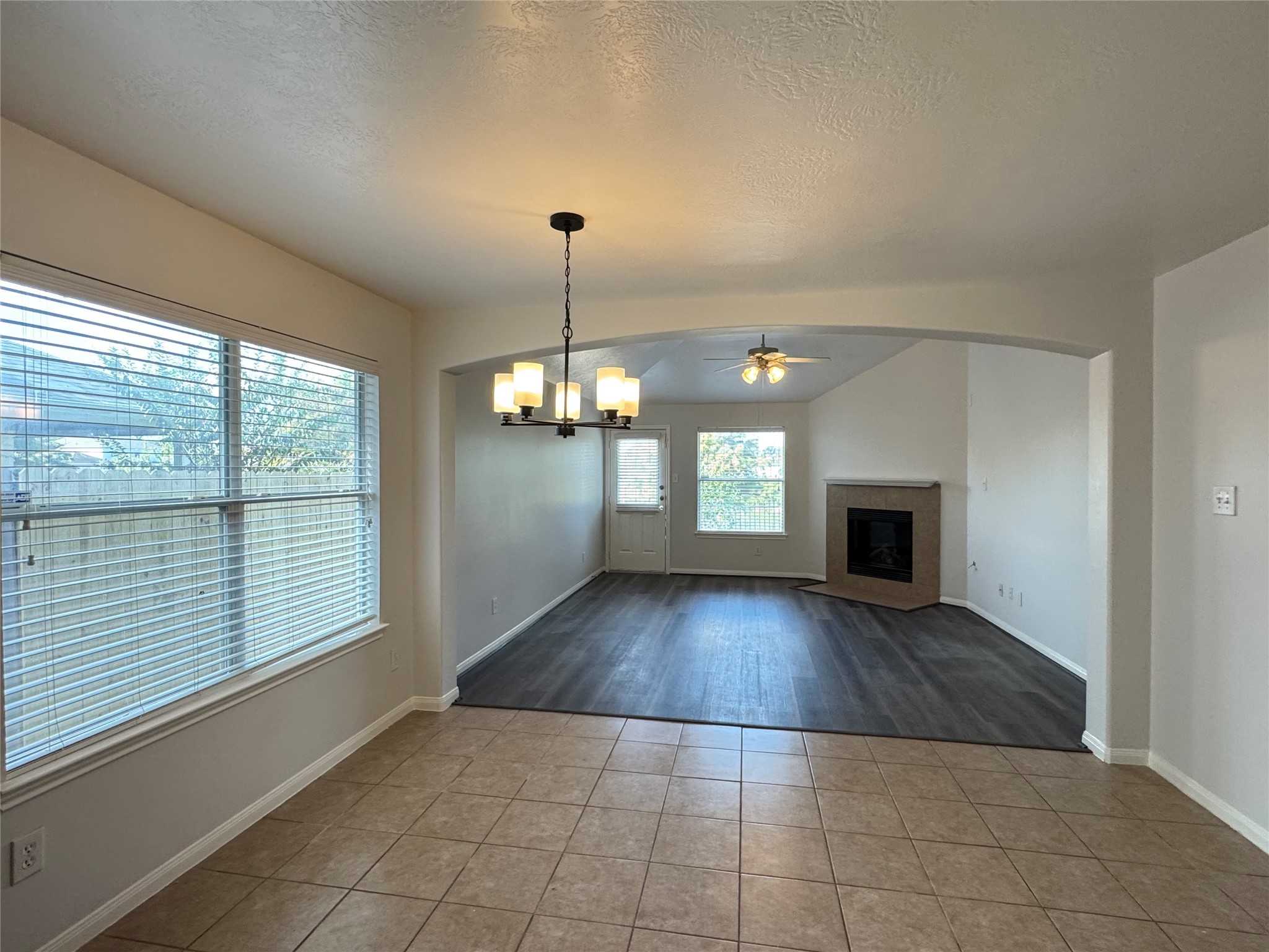 21543 Falvel Misty Drive Spring, TX 77388 - Photo 11 of 40 a view of empty room with wooden floor and fireplace