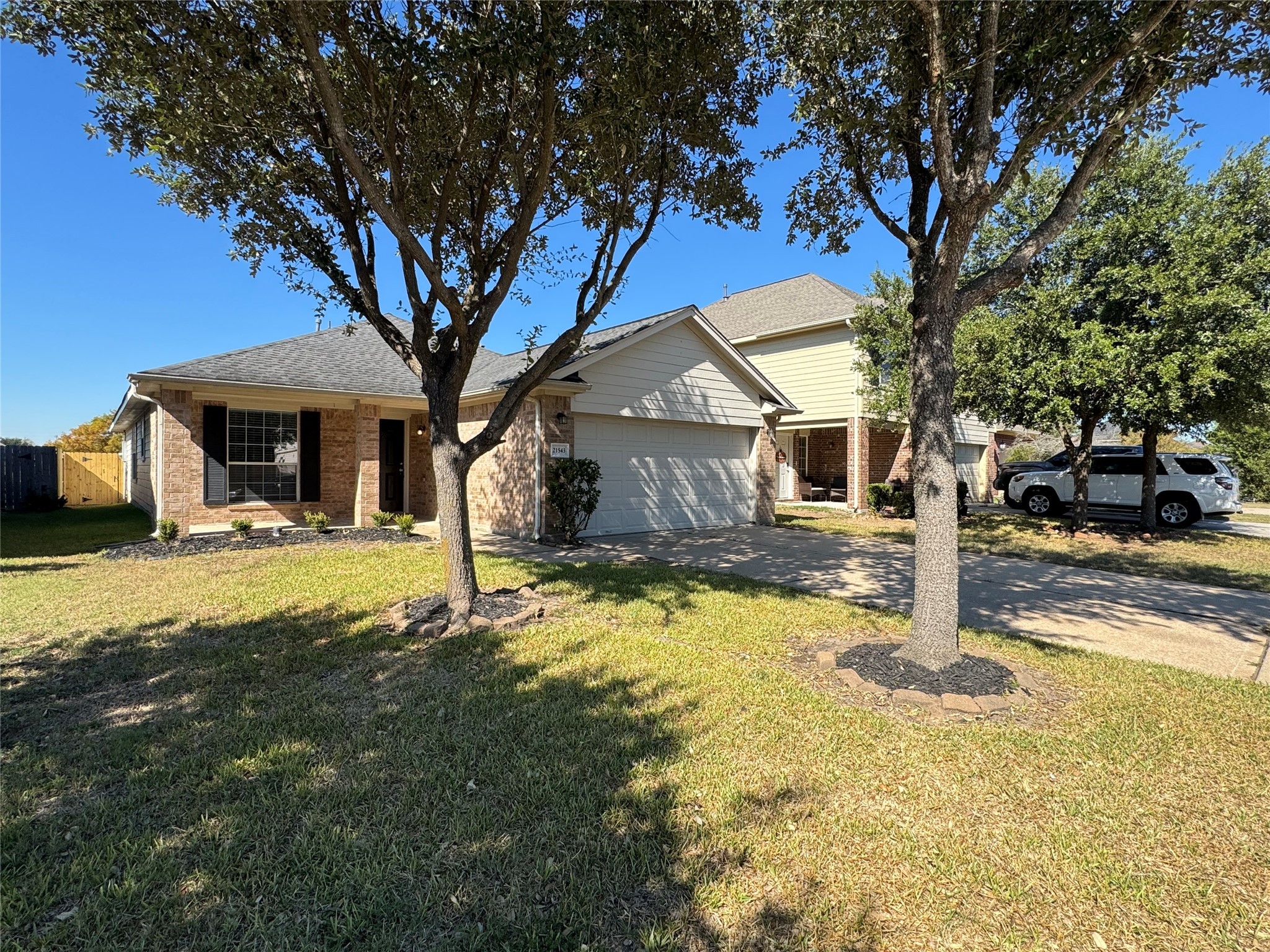21543 Falvel Misty Drive Spring, TX 77388 - Photo 2 of 40 a front view of a house with a yard
