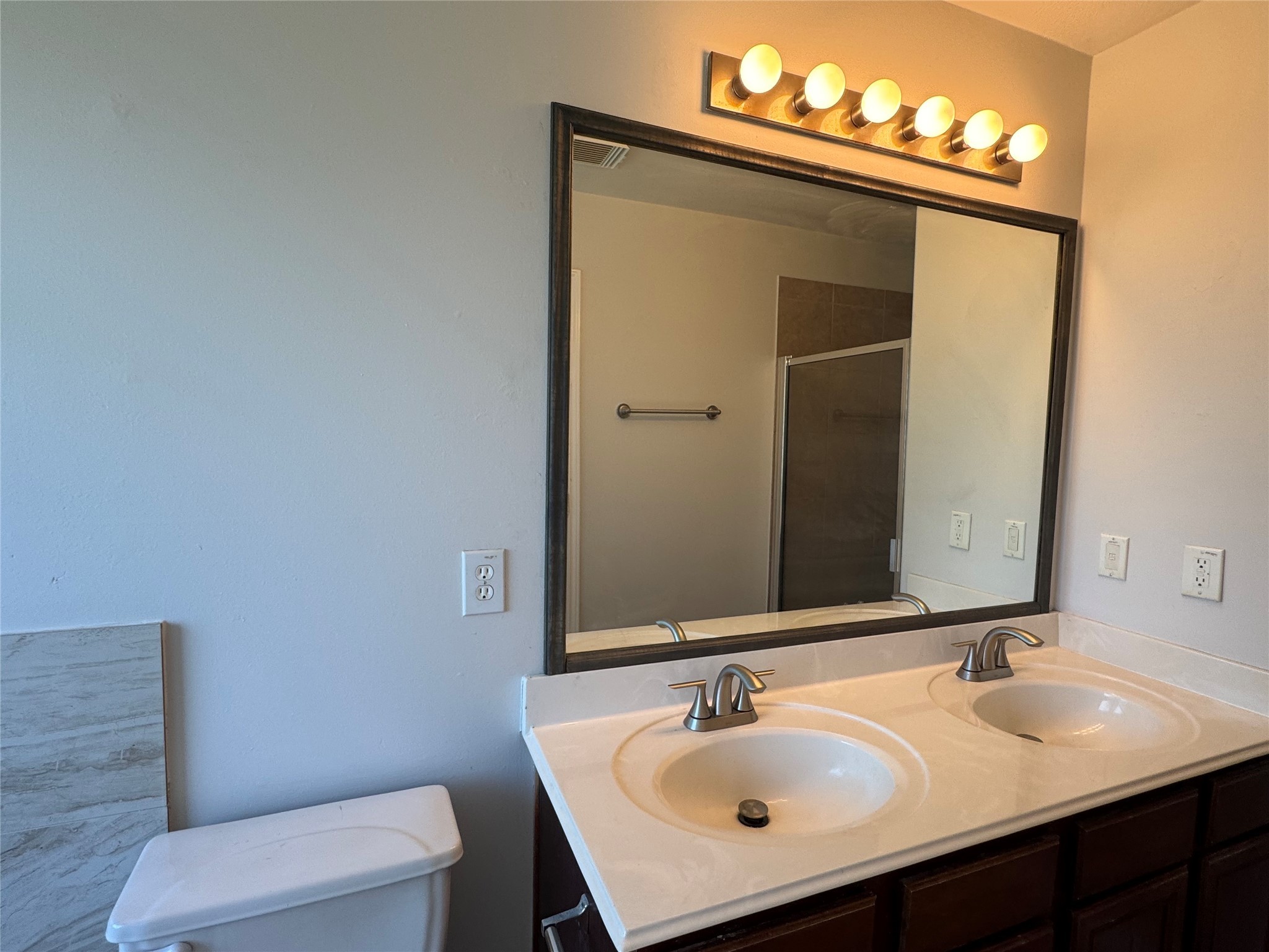 21543 Falvel Misty Drive Spring, TX 77388 - Photo 22 of 40 a bathroom with a sink and a mirror