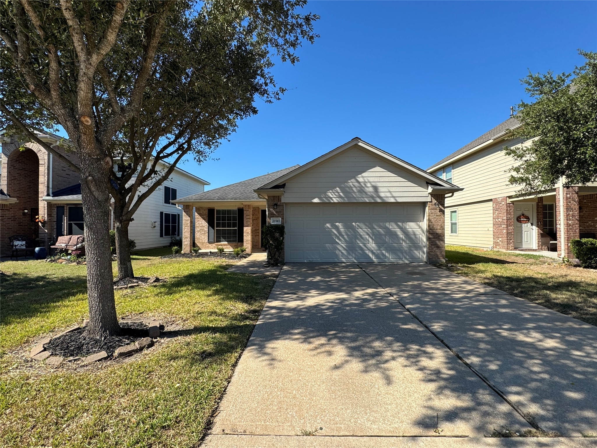21543 Falvel Misty Drive Spring, TX 77388 - Photo 3 of 40 a front view of a house with garden