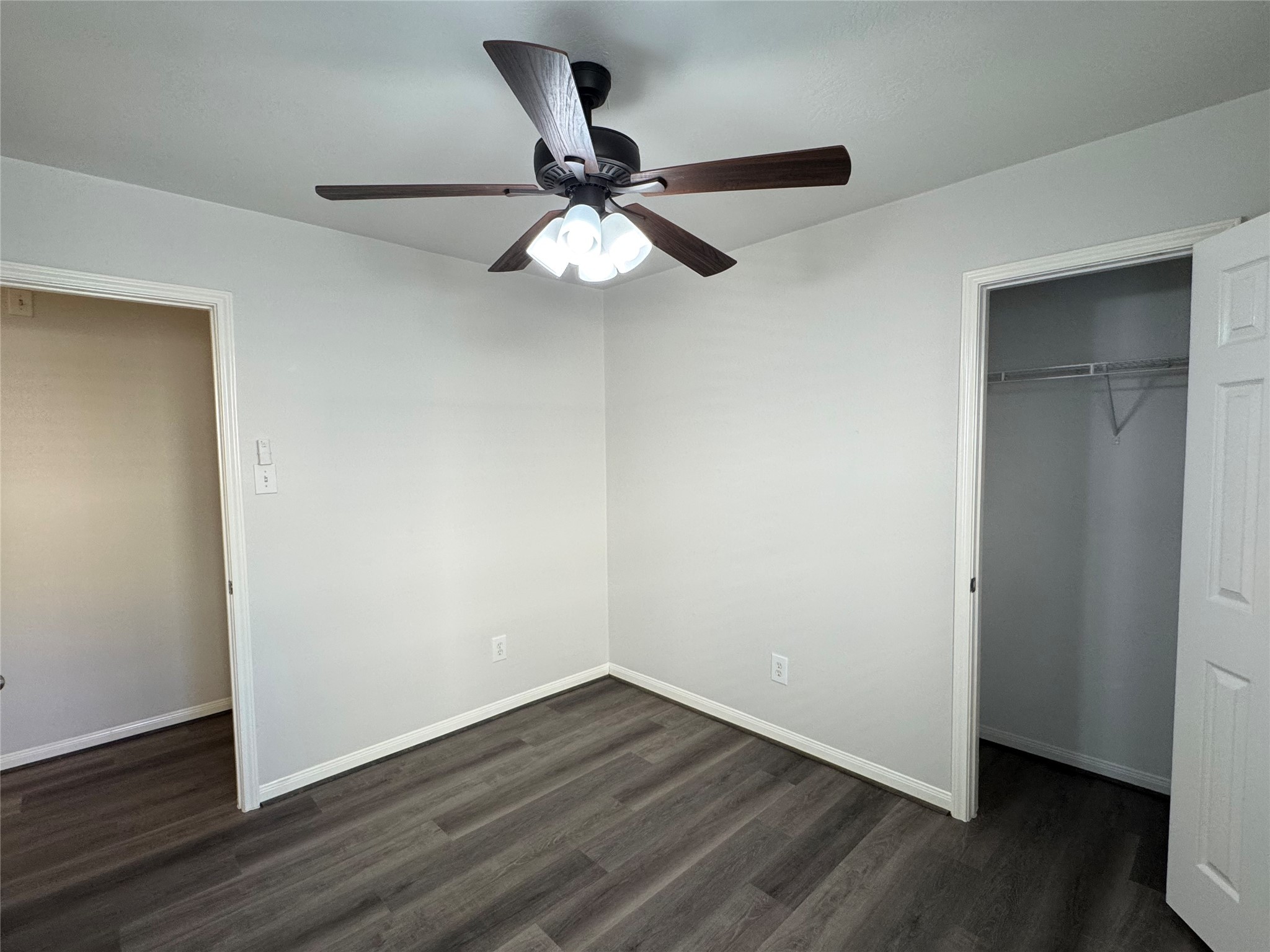 21543 Falvel Misty Drive Spring, TX 77388 - Photo 33 of 40 a view of an empty room with wooden floor