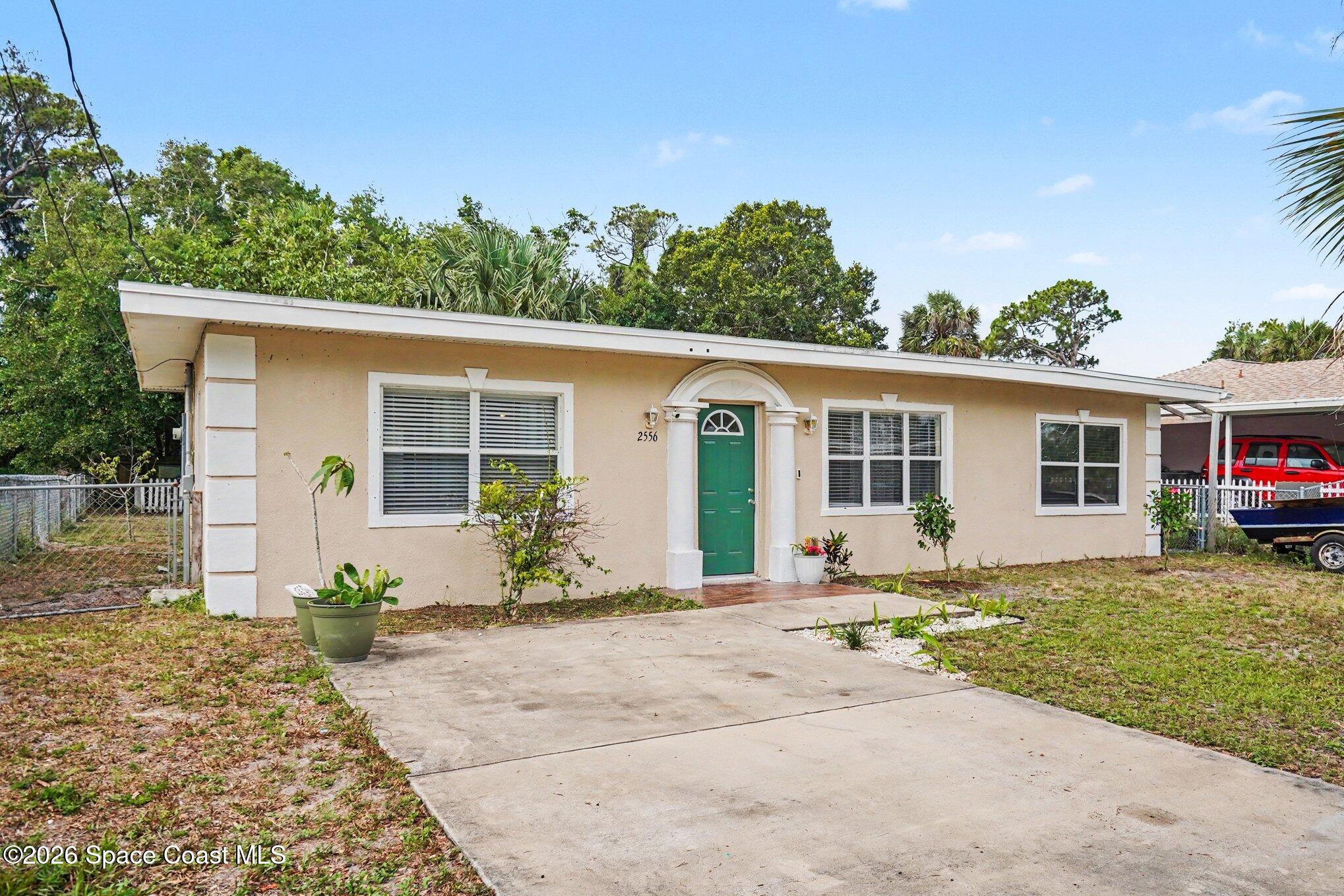 2556 1st Avenue Northeast Palm Bay, FL 32905 - Photo 2 of 27 002_file_4852