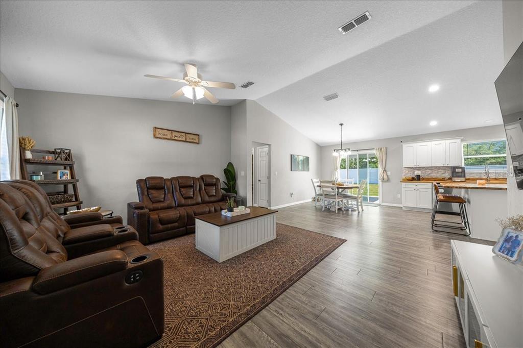 13 Teak Loop Place Ocala, FL 34472 - Photo 7 of 36 a living room with furniture or couch and a view of kitchen