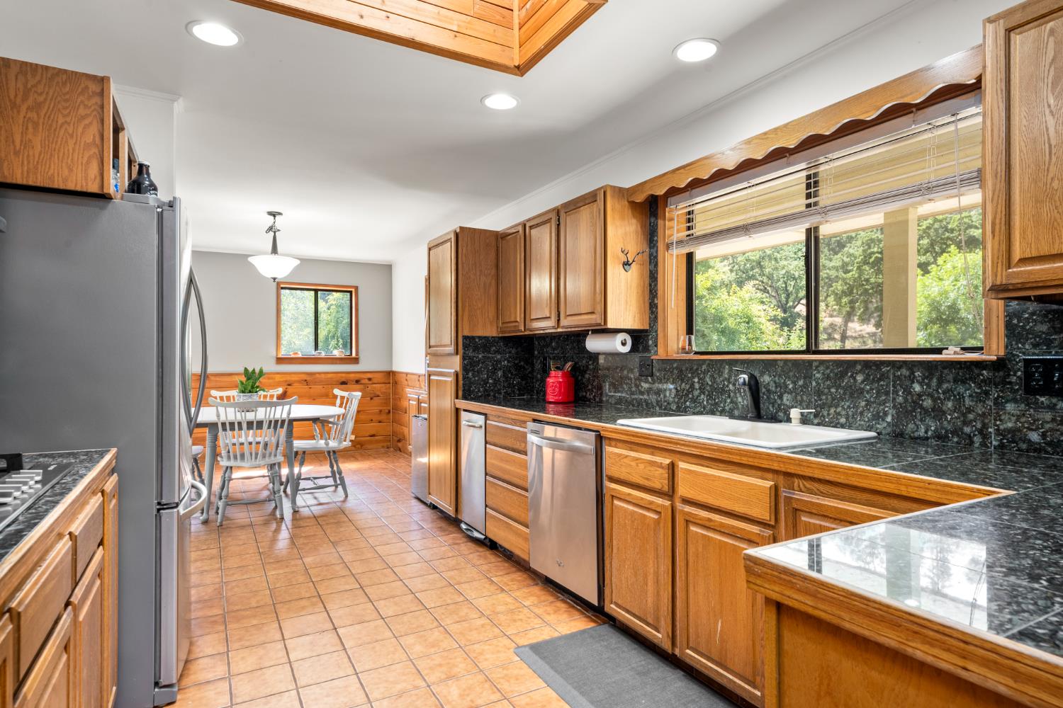 2162 Painted Pony Road Somerset, CA 95684 - Photo 7 of 65 a kitchen with a sink cabinets and window