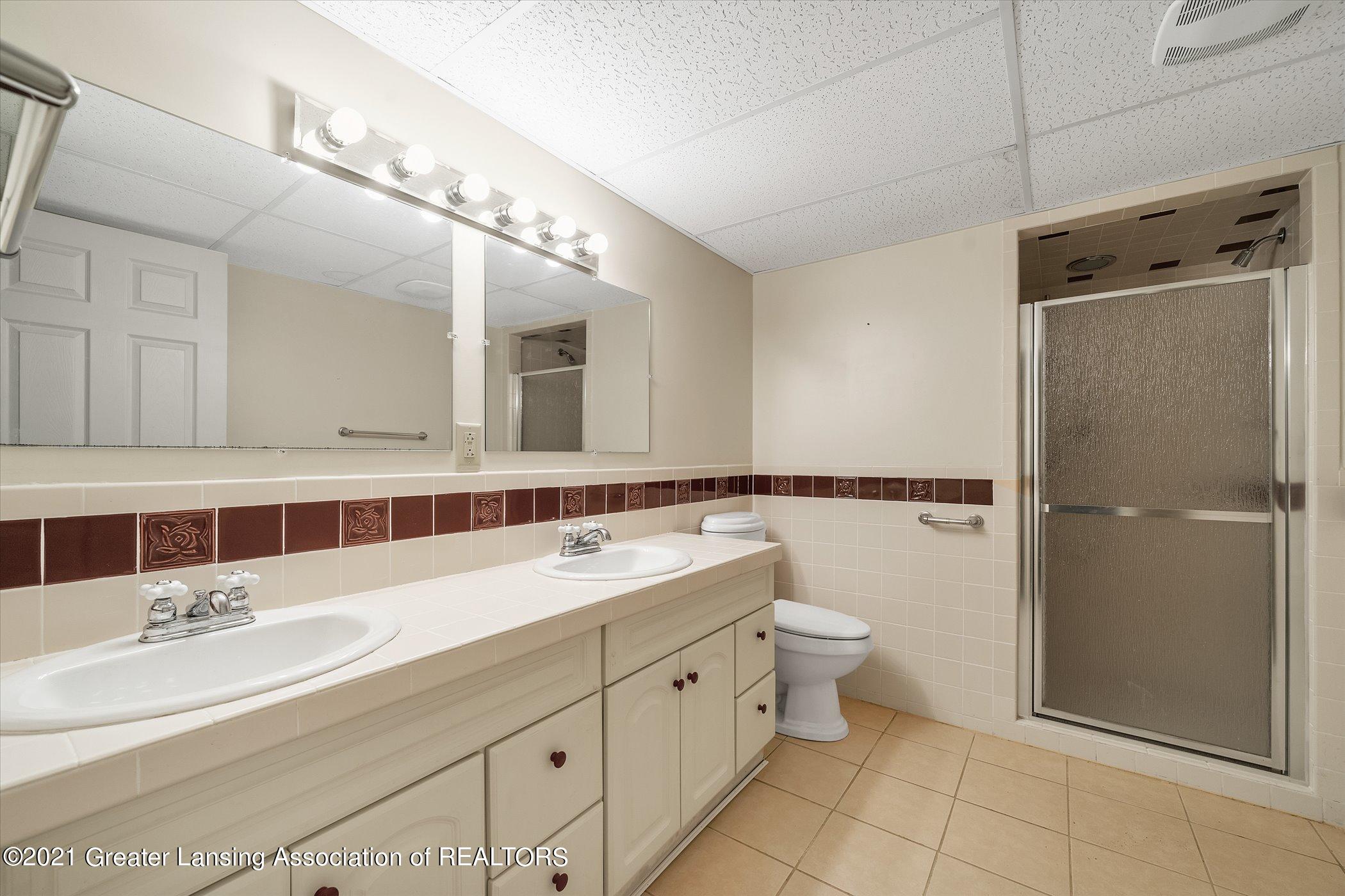 442 Shoesmith Road Haslett, MI 48840 - Photo 33 of 48 (32) LOWER LEVEL Full Bathroom