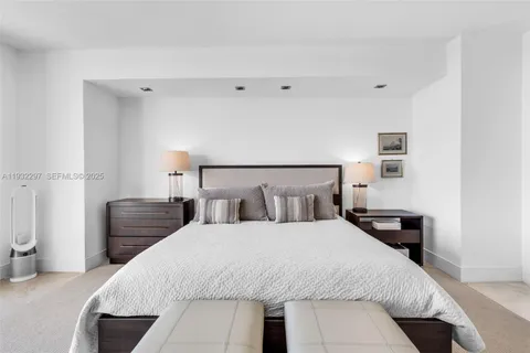 a bathroom with a double vanity sink and mirror