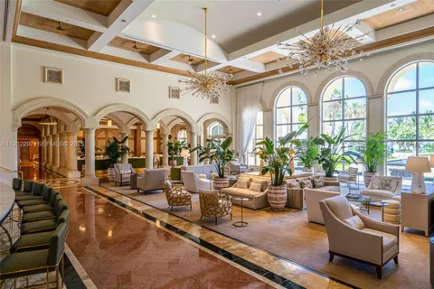 a view of a garden with palm trees