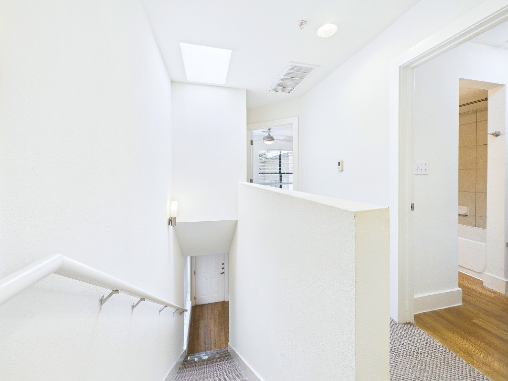 711 West 32nd Street, Unit 126 Austin, TX 78705 - Photo 8 of 15 a view of a hallway with workspace