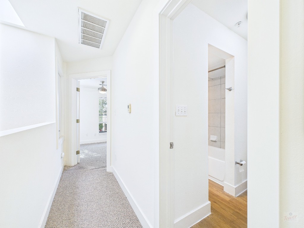 711 West 32nd Street, Unit 126 Austin, TX 78705 - Photo 9 of 15 a view of a bathroom with white walls