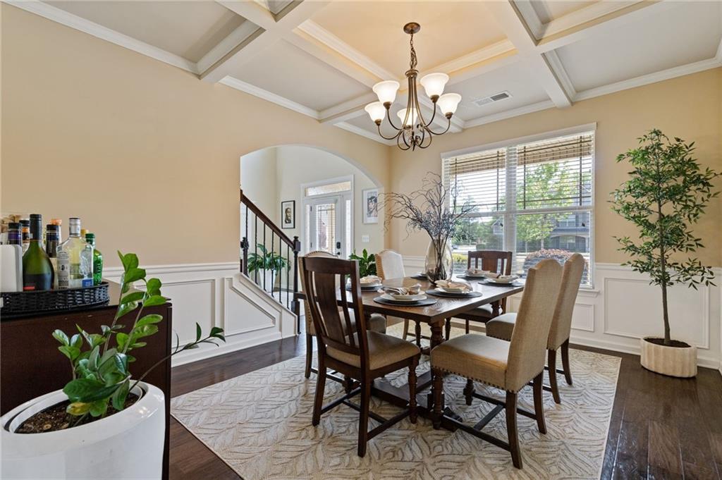2352 Alexander Top Place Grayson, GA 30017 - Photo 11 of 66 a view of a dining room with furniture window and wooden floor