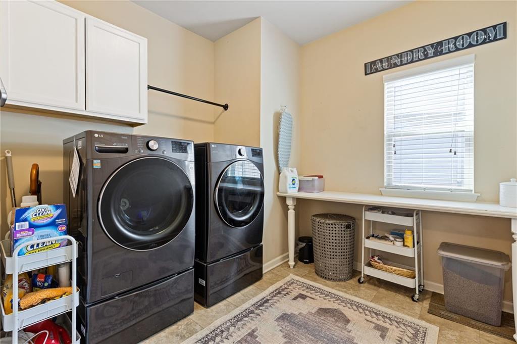 2352 Alexander Top Place Grayson, GA 30017 - Photo 28 of 66 a utility room with dryer and washer