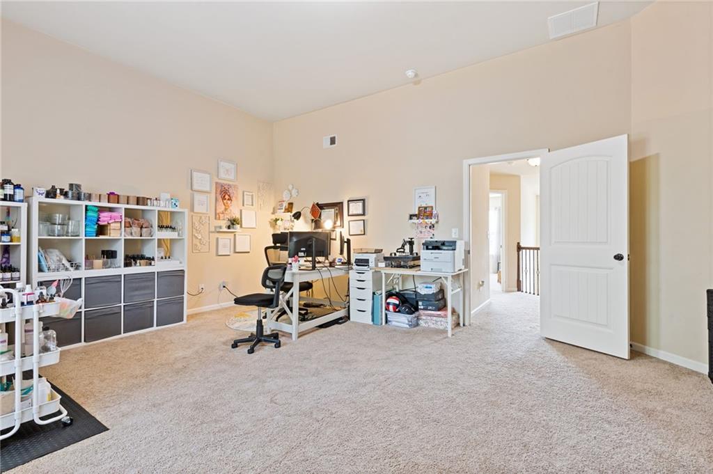2352 Alexander Top Place Grayson, GA 30017 - Photo 53 of 66 a view of a livingroom with workspace and a window