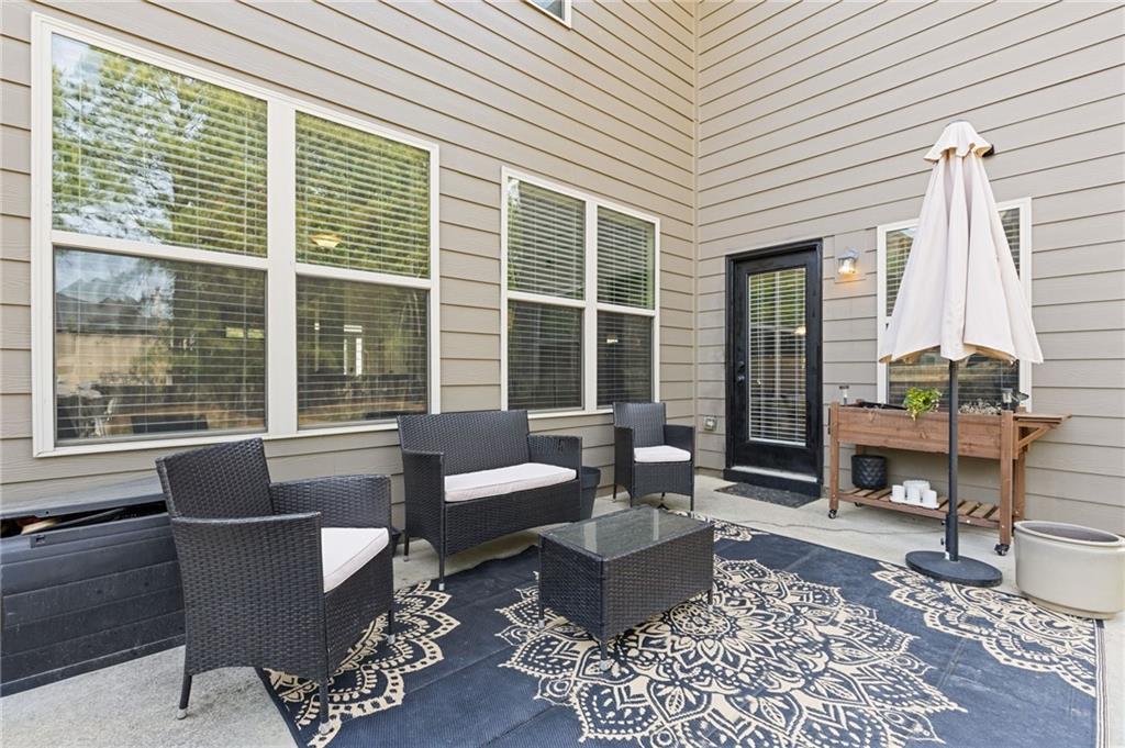 2352 Alexander Top Place Grayson, GA 30017 - Photo 56 of 66 a living room with furniture and a large window