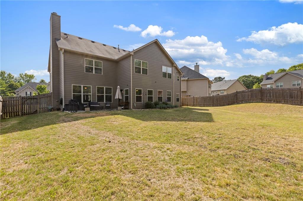 2352 Alexander Top Place Grayson, GA 30017 - Photo 60 of 66 a house view with swimming pool in front of it