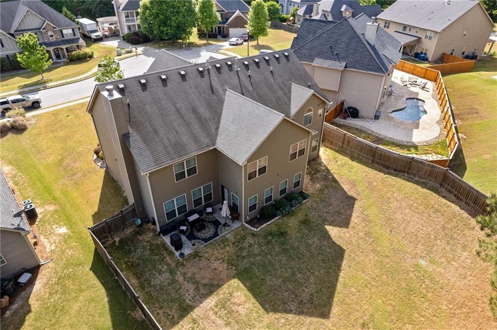 2352 Alexander Top Place Grayson, GA 30017 - Photo 64 of 66 an aerial view of a house with swimming pool