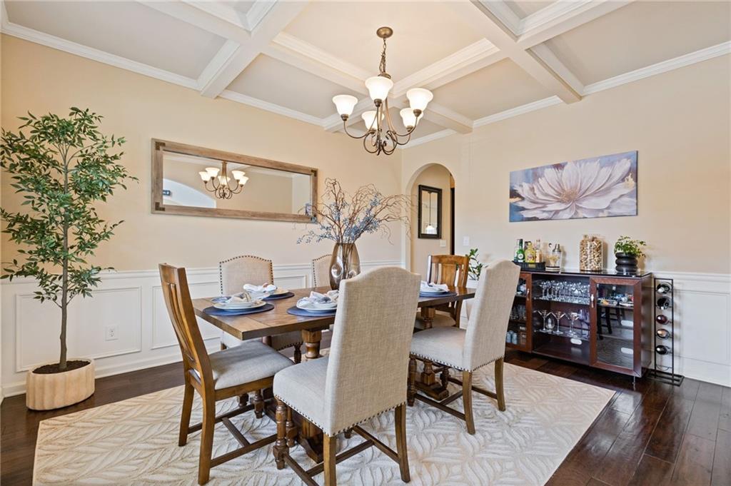 2352 Alexander Top Place Grayson, GA 30017 - Photo 10 of 66 a view of a dining room with furniture and wooden floor