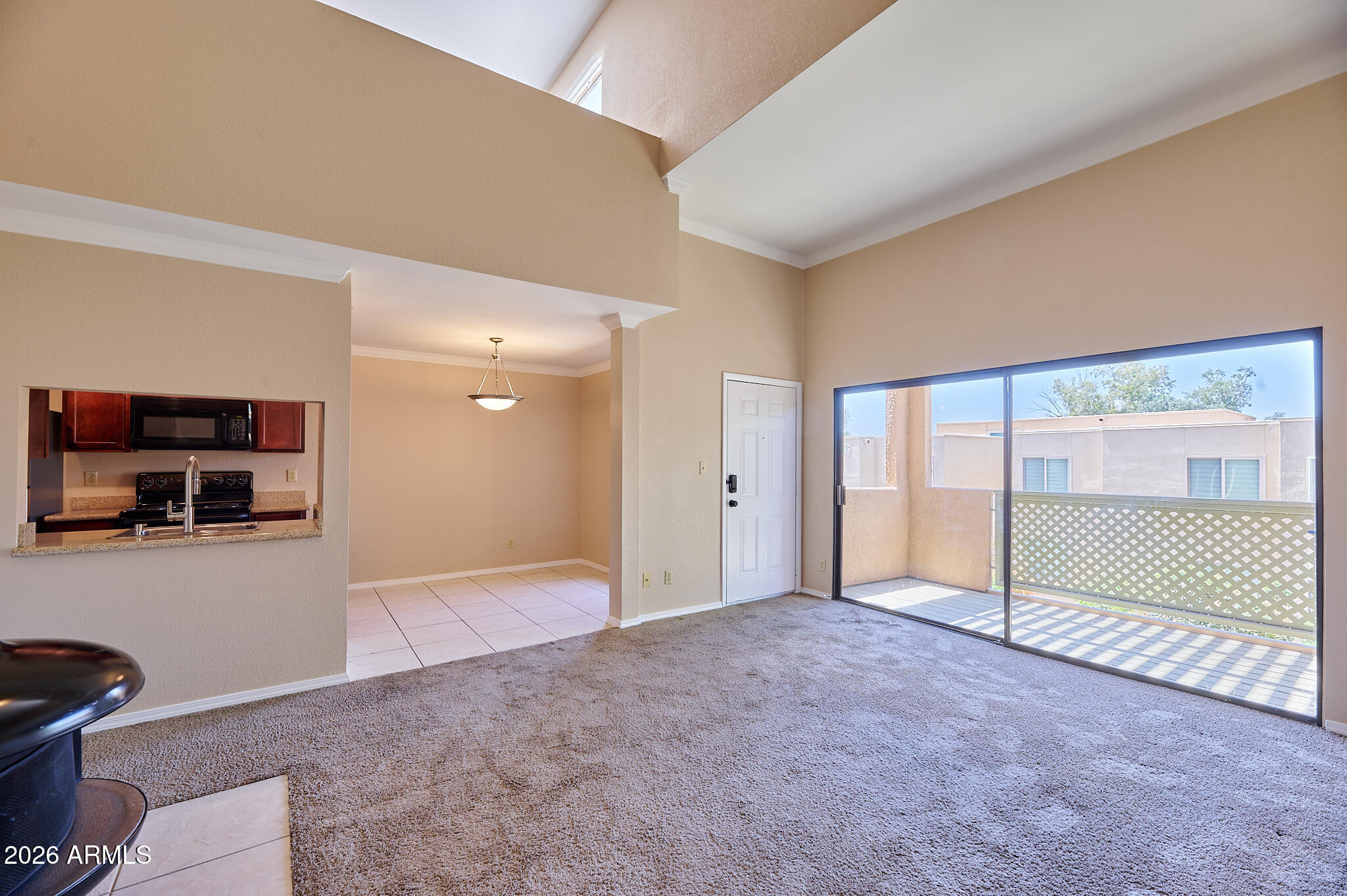 3500 North Hayden Road, Unit 310 Scottsdale, AZ 85251 - Photo 3 of 26 Living Room w Balcony View