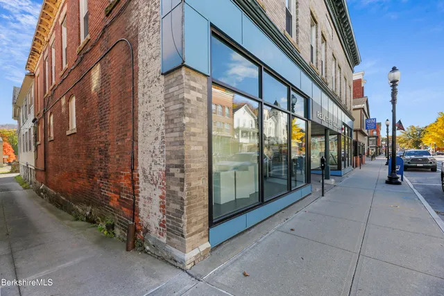 a view of a building with a glass door